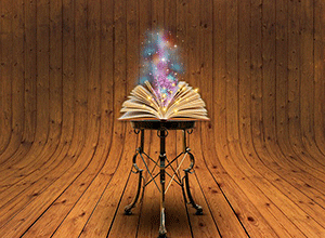 Из раскрытой книги поднимается искрящийся свет — иллюстрация к публикации «Скачать звук волшебства»